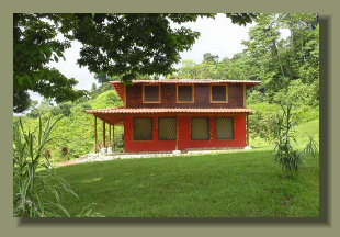 Two stories House in a farmland forest land on the hills close to Puerto Jimenez, Osa Peninsula